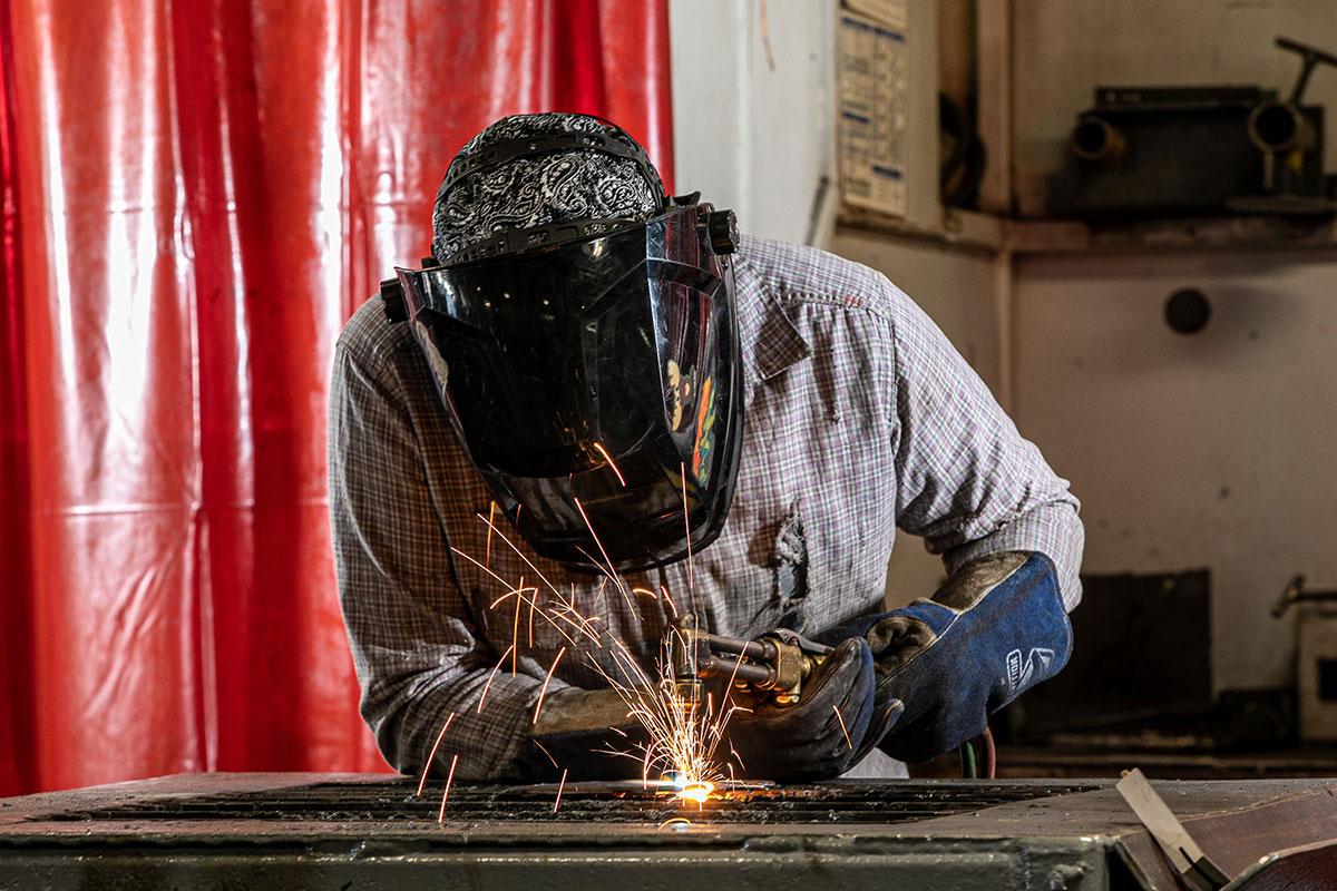 Person welding.